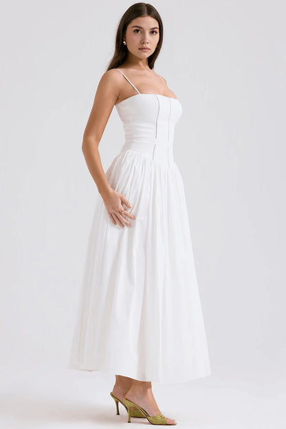 Vestido modelador MARINELLA de Veska, ajustado y elegante, mostrado en la imagen con detalles en tela negra y diseño ceñido.
