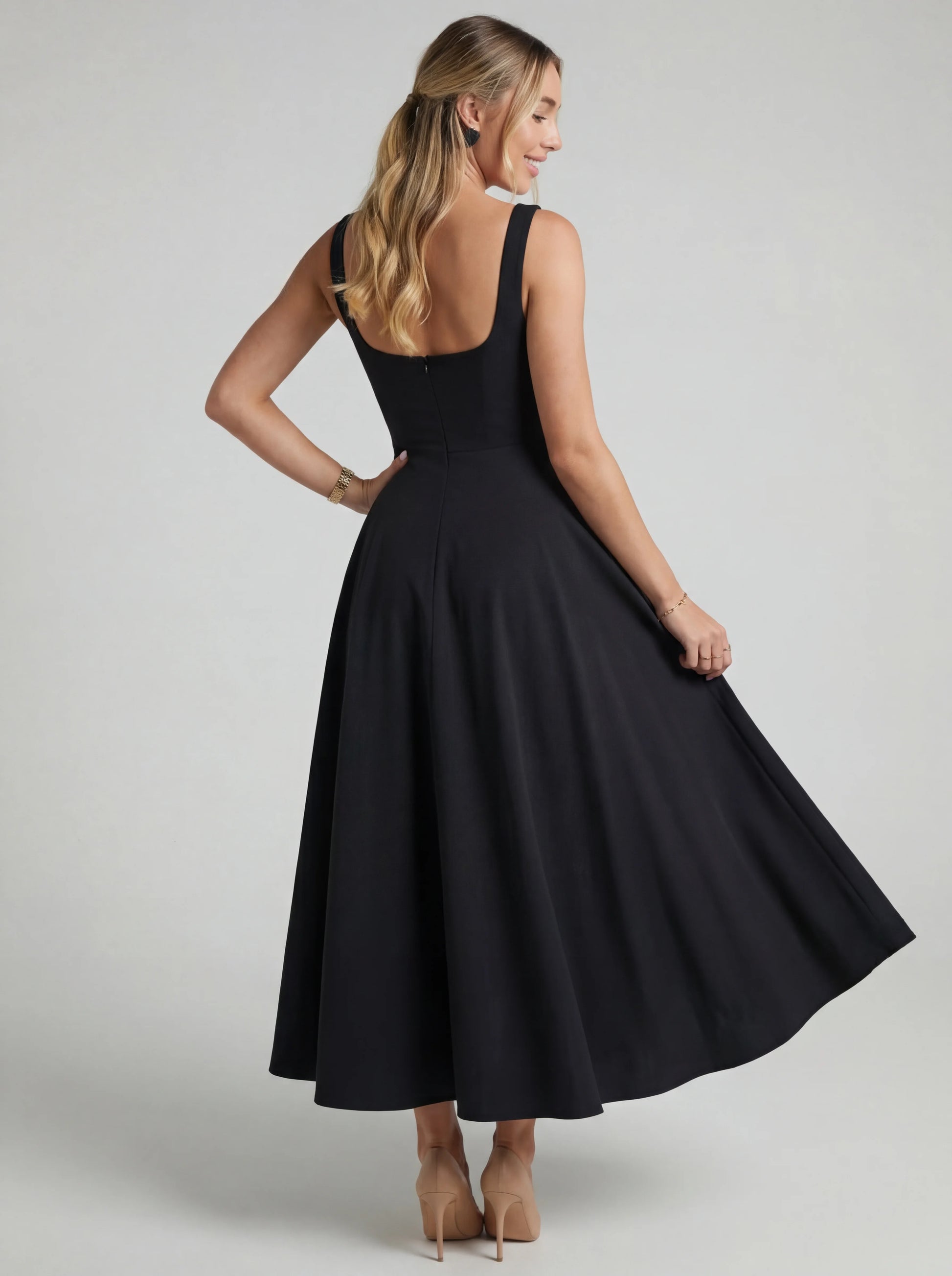 Vestido de vuelo Melissa Veska, con falda amplia y detalles elegantes, estilo femenino y moderno en color suave.