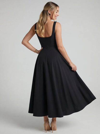 Vestido de vuelo Melissa Veska, con falda amplia y detalles elegantes, estilo femenino y moderno en color suave.