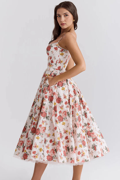 Vestido midi de la marca Veska, con diseño elegante y detalles en la parte superior, en color neutro.