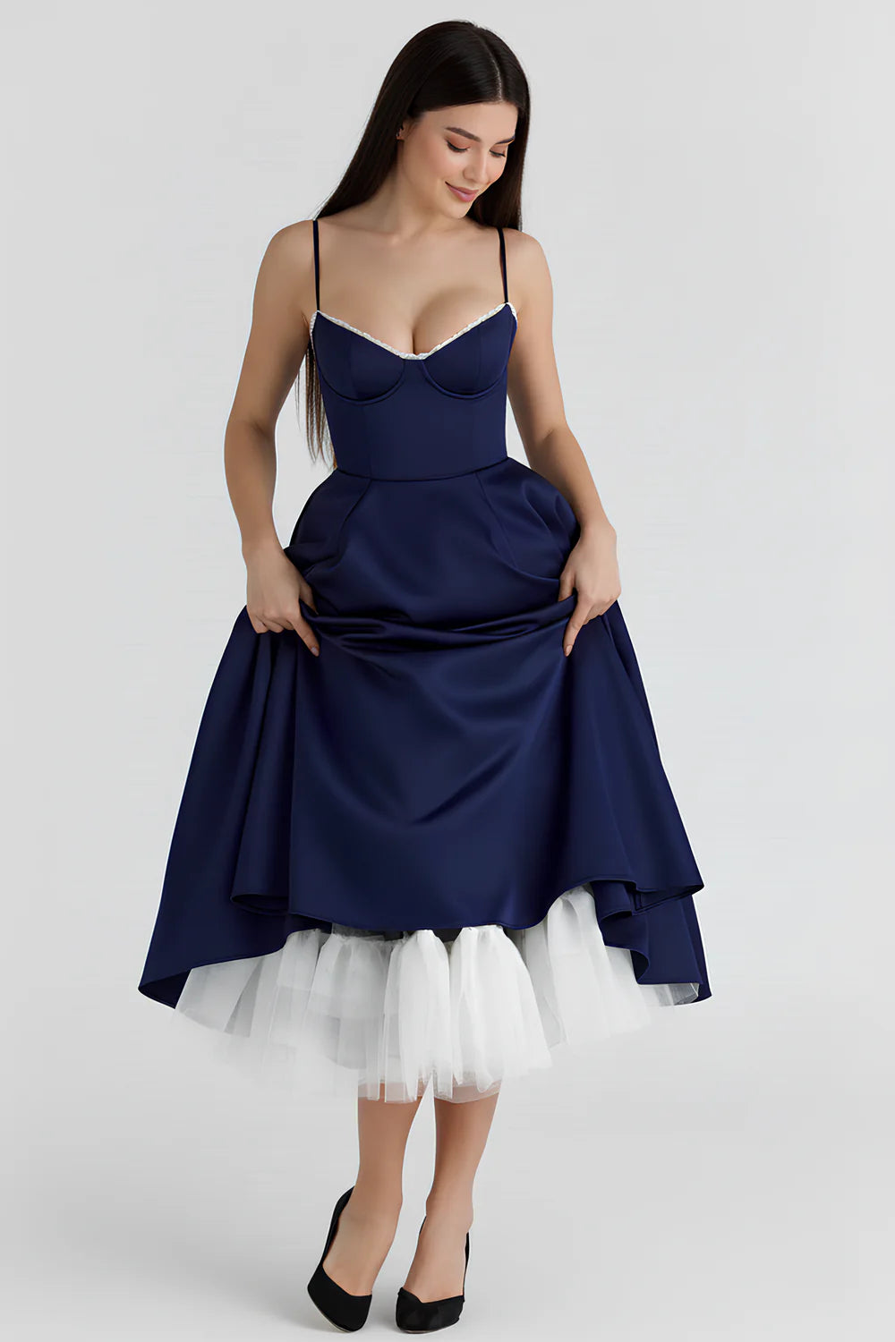Vestido midi de la marca Veska con diseño elegante y detalles en la tela, ideal para ocasiones especiales.