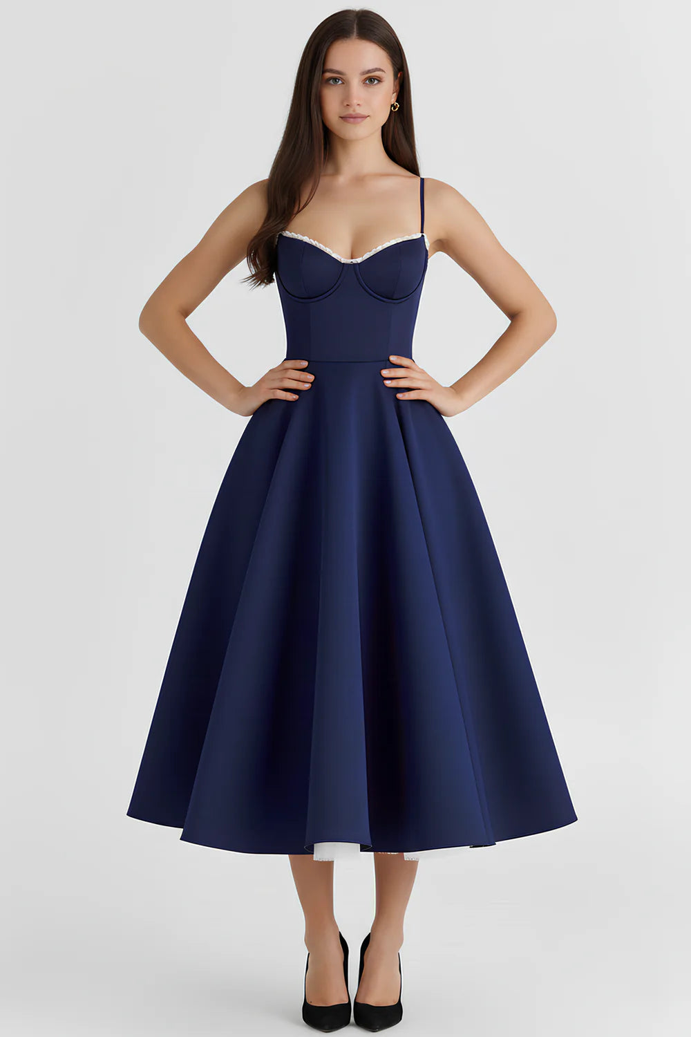 Vestido midi de la marca Veska, estilo elegante de Chloe, con detalles en la parte superior y faldón fluido en color neutro.