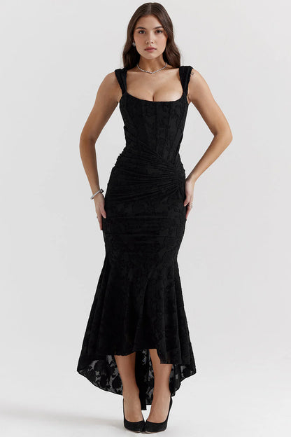 Vestido bustier Veska Ainhoa con diseño ajustado y detalles elegantes, en color neutro, mostrando la parte superior del vestido.
