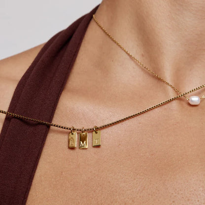 Collar chapa iniciales