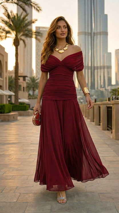 Vestido largo de gasa Isla I de Veska en color azul, con diseño fluido y elegante, ideal para ocasiones especiales.