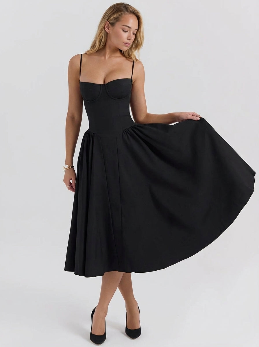 Vestido bustier Annie de Veska en color negro, con diseño ajustado y detalles elegantes en la parte superior.