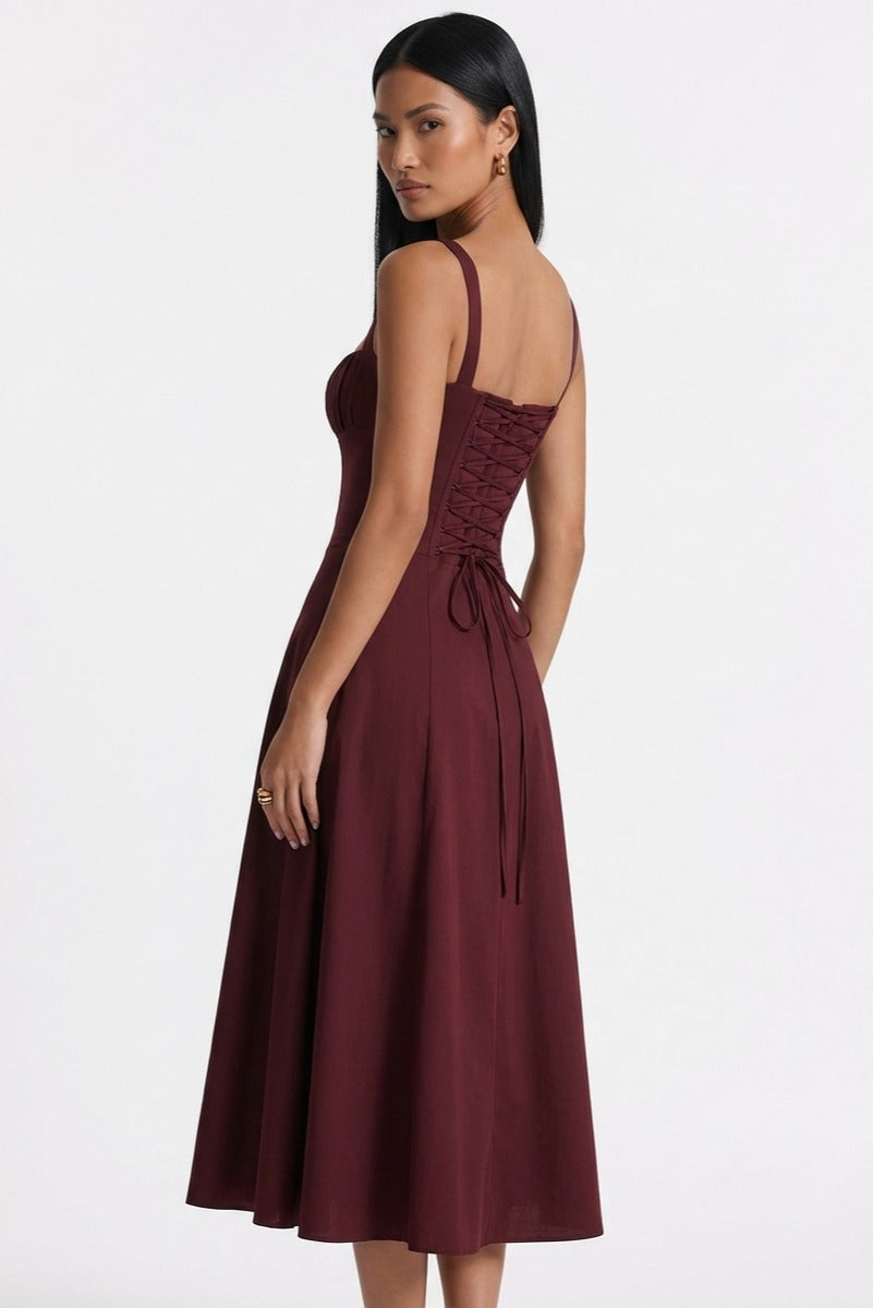 Vestido bustier de EVA de la marca Veska, en color negro con diseño ajustado y detalles elegantes.