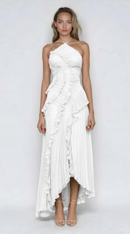 Vestido rosa con volantes de Veska, edición limitada, diseñado para ocasiones especiales, con detalles elegantes y estilo exclusivo.
