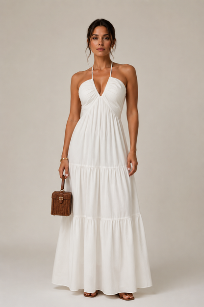 Vestido maxi halter de la marca VESKA, diseño largo y elegante con tirantes en forma de halter, en color negro.