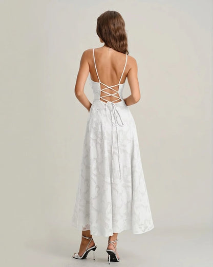 Vestido VESKA de gala de silueta en A confeccionado en exquisito tejido de Jacquard rígido.