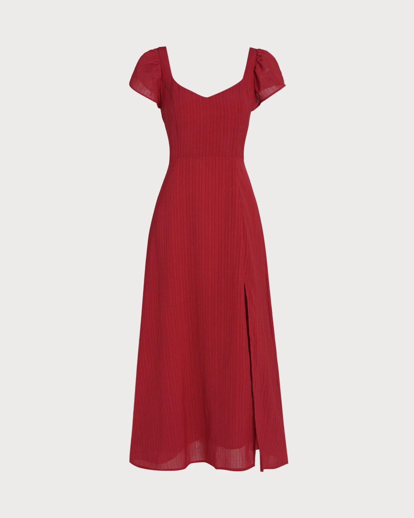 Vestido de gala VESKA con silueta en A, confeccionado en un sofisticado tejido Jacquard de alta estructura.