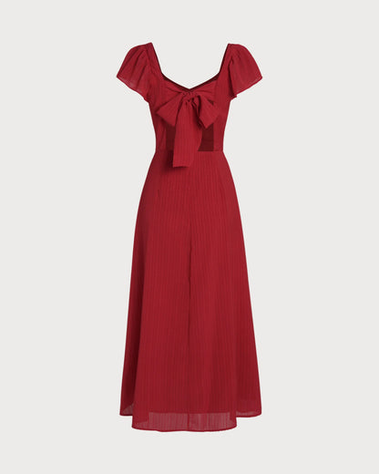 Vestido de gala VESKA con silueta en A, confeccionado en un sofisticado tejido Jacquard de alta estructura.