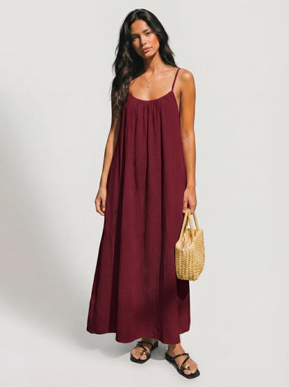 Vestido Veska Lena con espalda abierta, en varias opciones de color, diseñado para ocasiones elegantes y modernas.