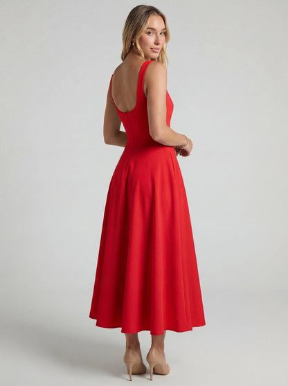 Vestido de vuelo Veska Melissa, con diseño ligero y femenino, en tonos suaves, visible con detalles de tela y estilo elegante.