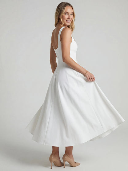 Vestido de vuelo Melissa por Veska, con falda amplia y detalles en el diseño, en color blanco y estilo elegante.