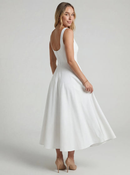 Vestido de vuelo Melissa de la marca Veska, diseño ligero y elegante, con detalles de vuelo en tela suave y moderna.