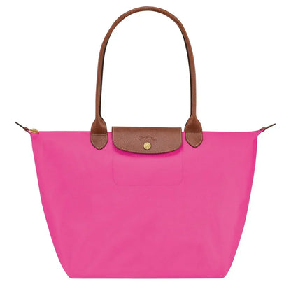 https://cdn.shopify.com/s/files/1/0891/6300/6288/files/longchamp-Candy-Shopper-L-Le-Pliage-Original.webp?v=1773418668
