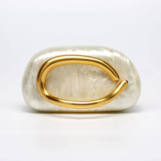 Clutch Riviera Veska de nácar con diseño elegante y asa, perfecta para ocasiones formales y estilos sofisticados.