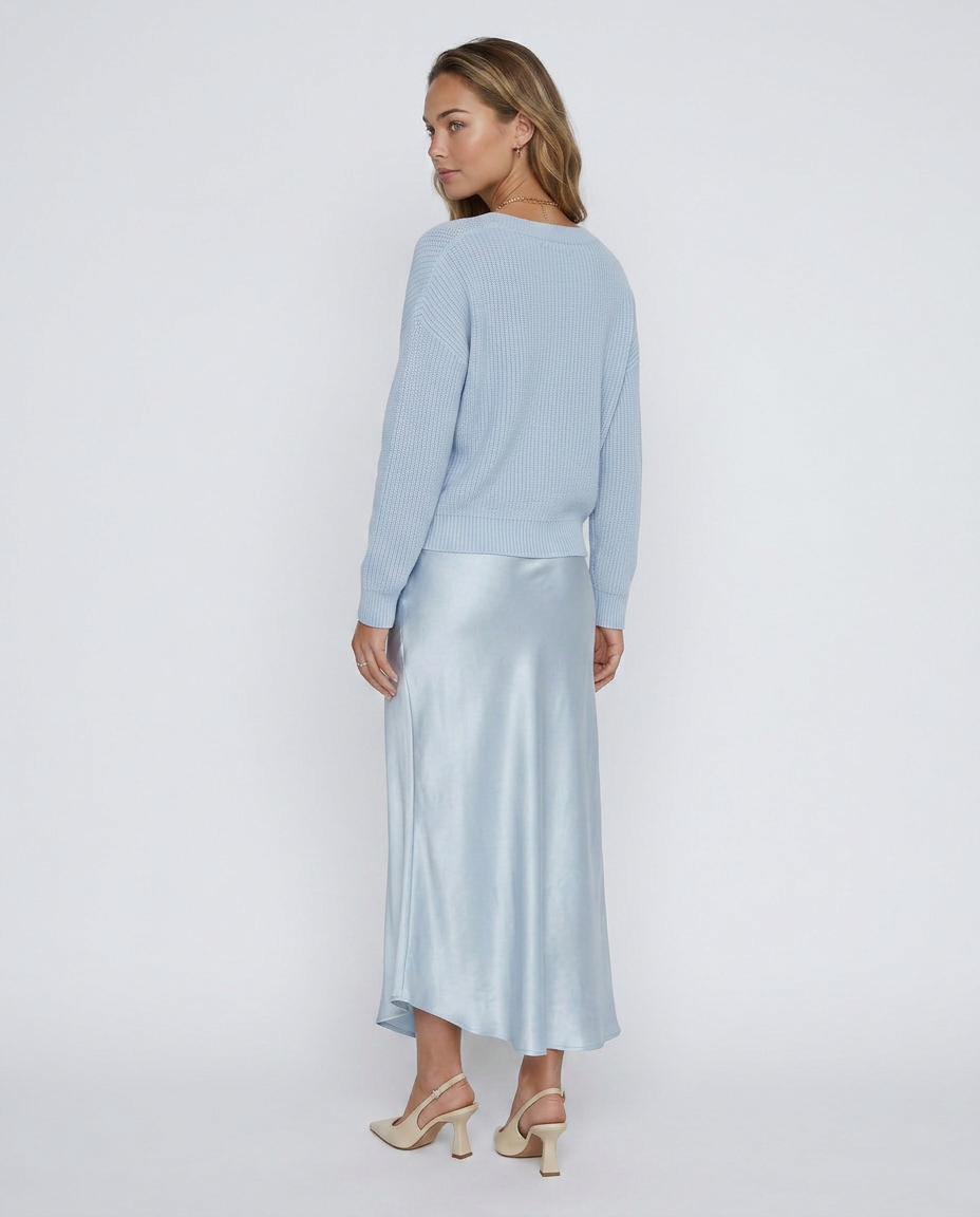 Vestido MARTINA de Veska con jersey gris y diseño moderno, ideal para ocasiones casuales y elegantes.