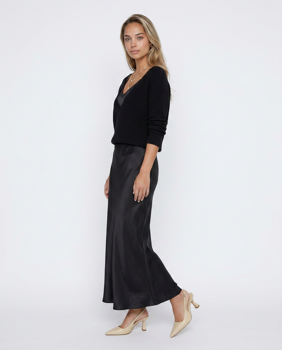 Vestido MARTINA con jersey de Veska, muestra la prenda en color neutro, con diseño elegante y tela cómoda.