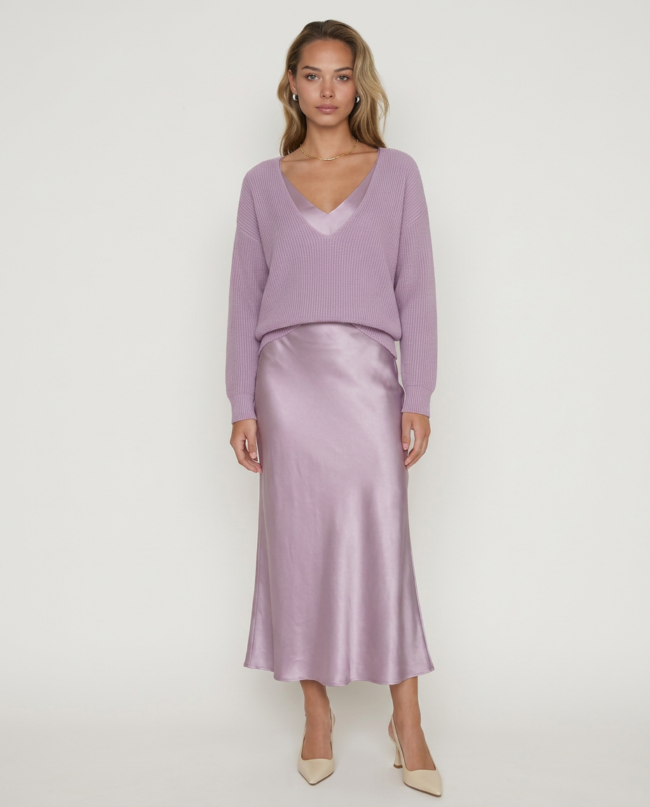 Vestido Martina de Veska con jersey gris, diseño elegante y cómodo, ideal para ocasiones casuales y formales.