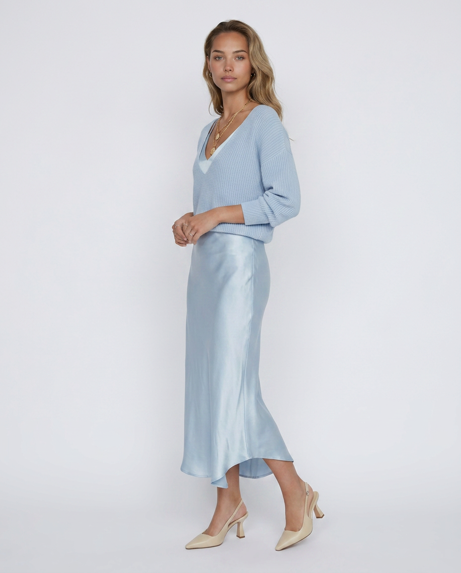 Vestido con jersey Martina de Veska, en color gris, con diseño elegante y cómodo para ocasiones casuales y formales.