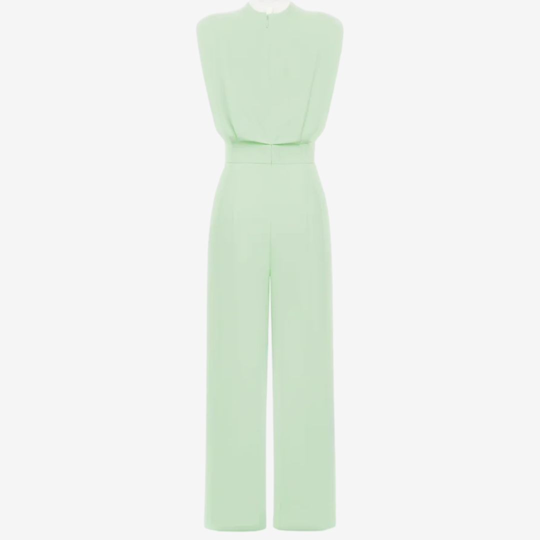 Vestido mono Veska con cinturilla ajustada y diseño estilizado, visible en la imagen.
